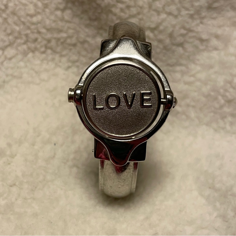 Silver rotating face Watch